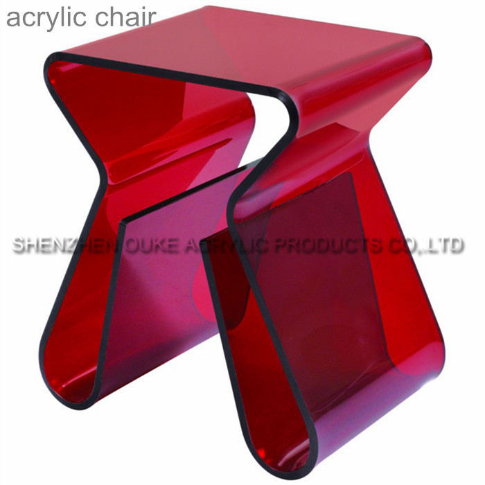 acrylic clear magazine cross chair.jpg